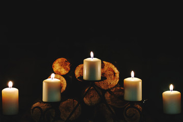 Burning in the dark candles
