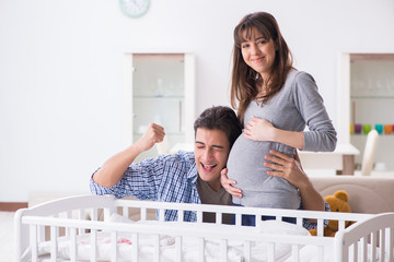 Young parents expecting their first baby