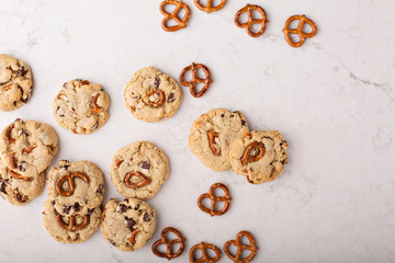 Chocolate chips and pretzels cookies on a marble table