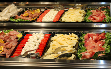 various appetizers arranged on various dishes