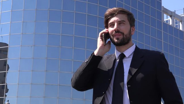 Smile face smiling portrait of corporation worker employer dialing cell phone 4K