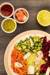 Asian Style Chargrilled Chicken Salad With Red Cabbage Carrots Edamame Beans and Hummus