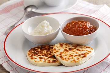 Cheese, cloudberry jam, and whipped cream