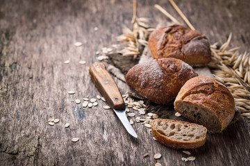 Fresh homemade buns on rustic background