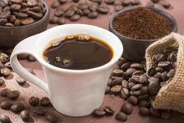 Coffee cup with coffee beans - Coffea
