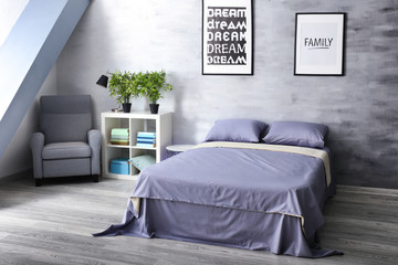 Cozy room interior with comfortable bed