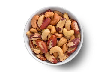 Brazilian and cashew nuts bowl on white background