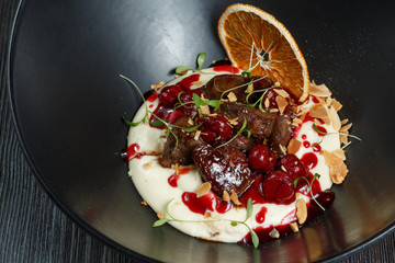 Grilled wild boar steaks with celery puree