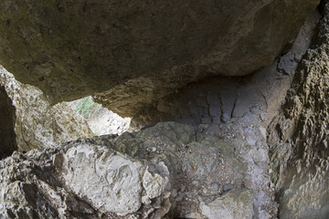 Spiral staircase in the crevice of the rock.