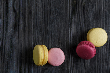 colorful macaroon on wood background