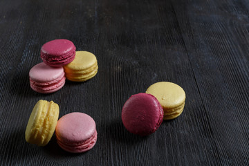 colorful macaroon on wood background