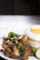 Basil Crispy Pork Belly over Rice Topped with Fried Egg