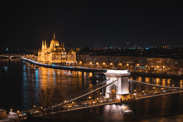 Fototapeta na wymiar Budapest Parliament And Chain Bridge Over Danube