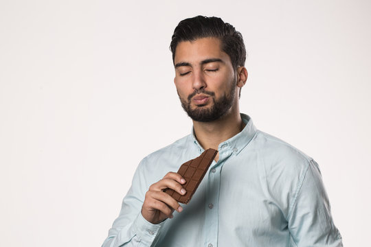 Young Man Enjoying Chocolate 