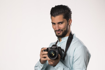 man photographer holding camera