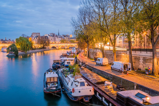 The Seine River With Boats At Night