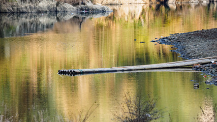 bamboo raft in peaceful lake.