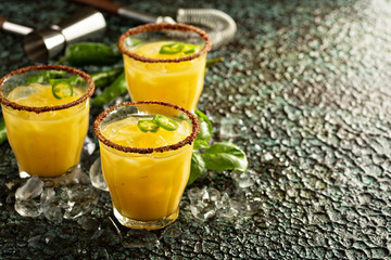 Spicy mango margaritas with hot pepper