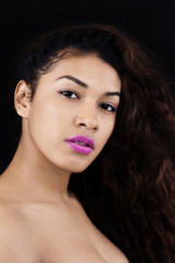 Fototapeta premium Bare Shoulder Portrait Attractive Latina Woman On Dark Background
