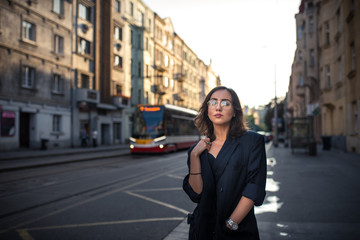Woman walking on the streets of Prague full of multiculturalism