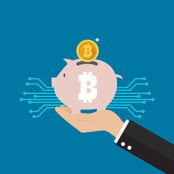 Hand holding bitcoin piggy bank