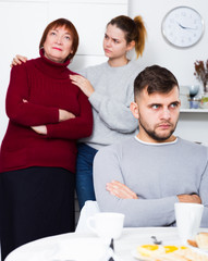 Fototapeta premium Young man offended after quarrel with family