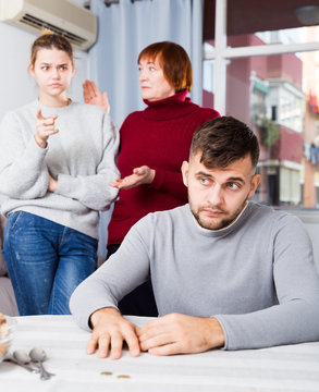 Chagrined guy having problems in relationship with family