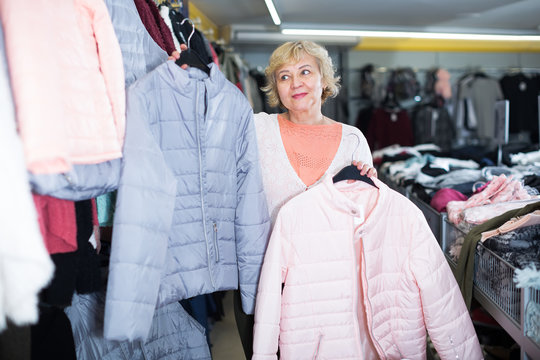  woman consumer buying windbreaker jackets