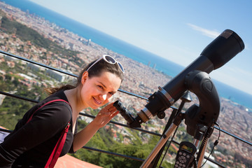 woman  looking in telescope
