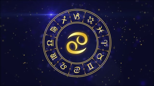 Zodiac sign Cancer and horoscope wheel on the dark blue background