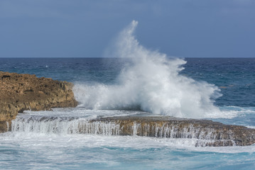 Panorama of the sea which smashes against rocks
