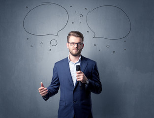 Businessman holding microphone