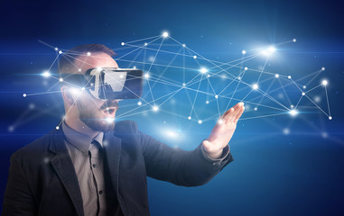 Businessman with virtual reality goggles