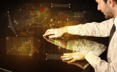 Fototapeta premium Hands navigate on high tech smart table with business icons