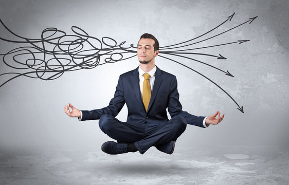 Businessman meditates with purifying doodle concept