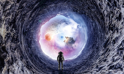 Space hole and astronaut. Mixed media