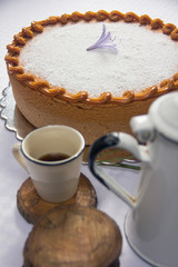 Vanilla cake withe powdered sugar and milk cream