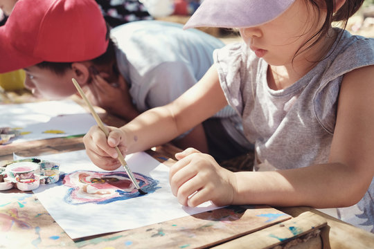 Kids painting art outdoor activity
