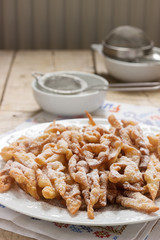 Angel wings biscuits, a traditional European sweet dish for carnival. Rustic style.
