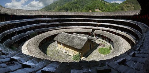 Tulou,traditional fortified circular cluster in tchu xi,fujian, china….