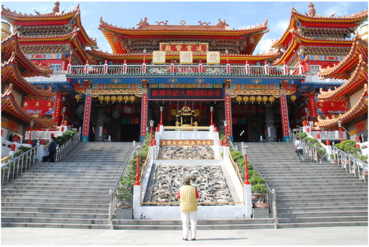 A Praying Woman By Kai Ming Tang Temple In Kaohsiung City Of Taiwan