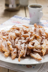 Angel wings biscuits, a traditional European sweet dish for carnival. Rustic style.