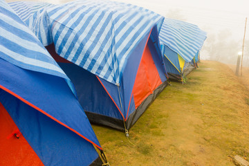 Travel tent in the morning with fog