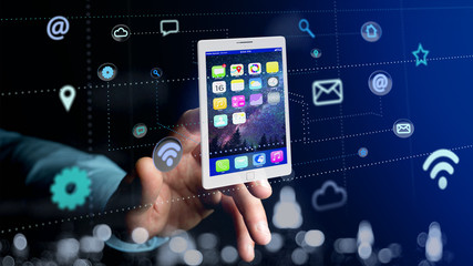 Businessman holding a tablet surrounding by app and social icon - 3d render