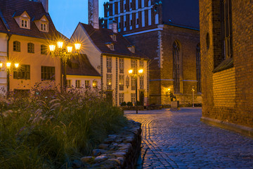 Night in old Riga - the capital of Latvia and famous Baltic city widely known due to its unique medieval and Gothic architecture