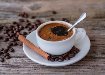 black coffee with white Cup on wooden table