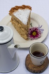 Vanilla cake withe powdered sugar and milk cream