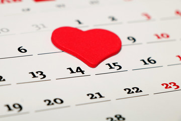Saint Valentine's Day. Date February 14 marked in the calendar symbol of the red heart.