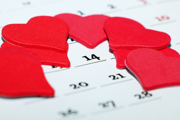 Saint Valentine's Day. Date February 14 marked in the calendar symbol of the red heart.