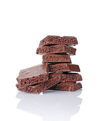 Close-up pieces of porous chocolate bar